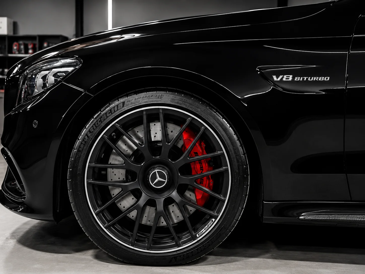 Mercedes-AMG wheel and brake caliper detail at Stow Smash Repairs workshop