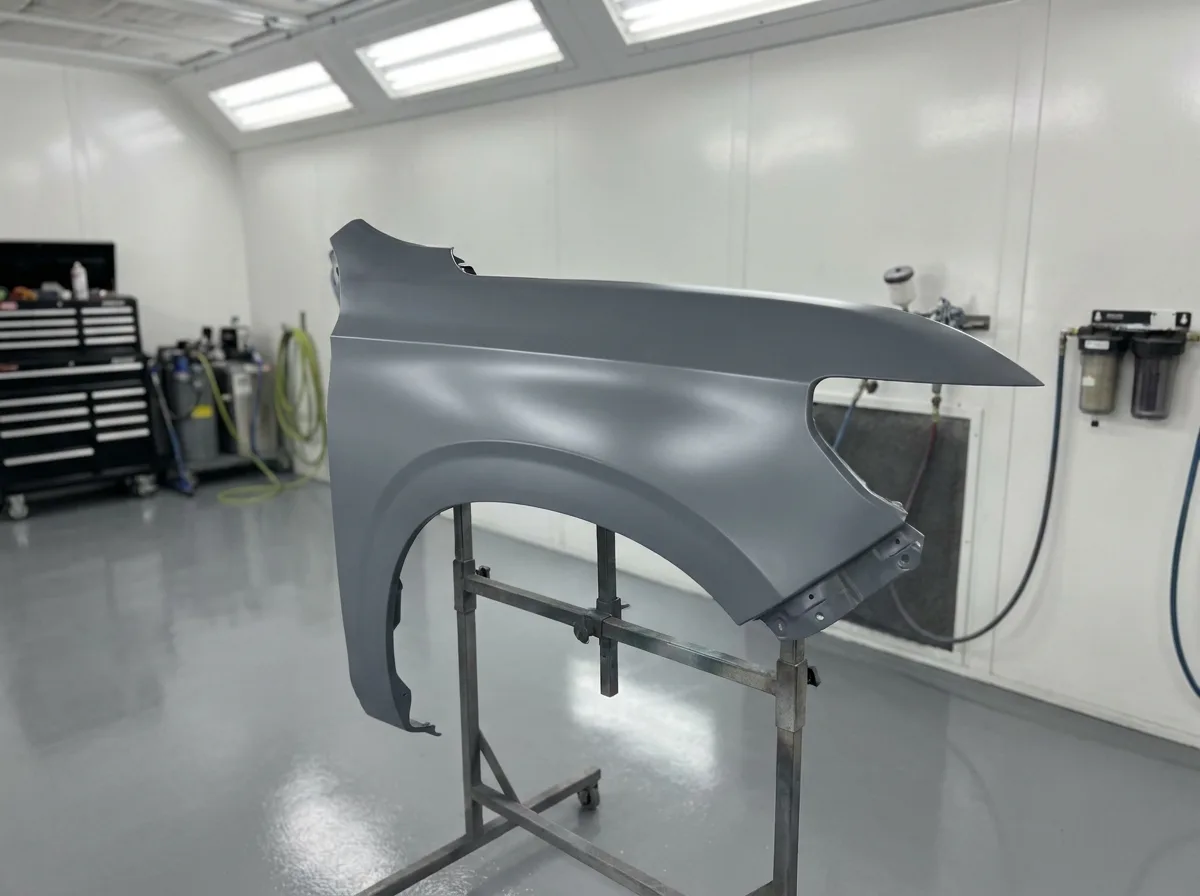 Freshly primed panel ready for paint booth at Stow Smash Repairs
